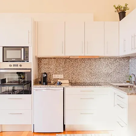 Namaste House I Relogio do Poiso