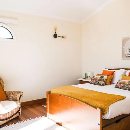 Namaste House I Relogio do Poiso