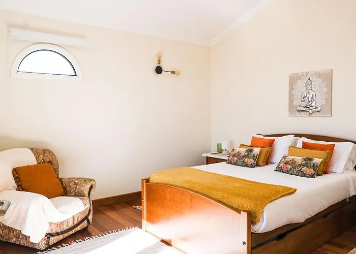 Namaste House I Relogio do Poiso